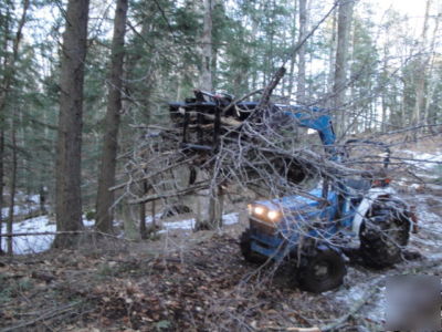 Tractor thumb / bucket grapple