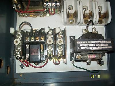 Size 0 & 00 magnetic motor starters in cabinet by a & b