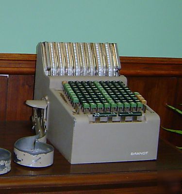 Brandt cash register coin dispenser and quick change 